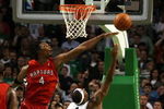 BOSTON - NOVEMBER 10:  Paul Pierce #34 of the Boston Celtics makes the shot despite the best effort of Chris Bosh #4 of the Toronto Raptors on November 10,  2008 at TD Banknorth Garden in Boston, Massachusetts. Kendrick Perkins of the Celtics and Jermaine O'Neal #6 of the Raptors look on. The Celtics defeated the Toronto Raptors 94-87.  NOTE TO USER: User expressly acknowledges and agrees that, by downloading and/or using this Photograph, user is consenting to the terms and conditions of the Getty Images License Agreement.  (Photo by Elsa/Getty Images)
