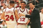 30 Mar 1996: Head coach John Calipari of the UMass Minutemen talks with guards Edgar Padilla #12 and Carmelo Travieso #24 during the NCAA Final Four Semifinal game against the Kentucky Wildcats at the Continental Air Arena in East Rutherford, New Jersey.