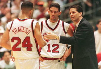 30 Mar 1996: Head coach John Calipari of the UMass Minutemen talks with guards Edgar Padilla #12 and Carmelo Travieso #24 during the NCAA Final Four Semifinal game against the Kentucky Wildcats at the Continental Air Arena in East Rutherford, New Jersey.