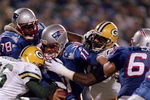 27 Oct 1997:  Quarterback Drew Bledsoe of the New England Patriots gets sacked during a game against the Green Bay Packers at Foxboro Stadium in Foxboro, Massachusetts. Mandatory Credit: Al Bello  /Allsport