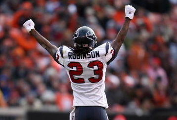 CLEVELAND - NOVEMBER 23:  Dunta Robinson #23 of the Houston Texans celebrates a missed field goal by the Cleveland Browns during the NFL game at Cleveland Browns Stadium on November 23, 2008 in Cleveland, Ohio.  (Photo by Andy Lyons/Getty Images)