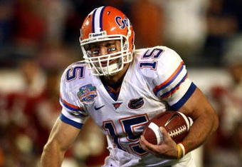 MIAMI - JANUARY 08:  Quarterback Tim Tebow #15 of the Florida Gators runs with the ball against the Oklahoma Sooners in the FedEx BCS National Championship Game at Dolphin Stadium on January 8, 2009 in Miami, Florida.  (Photo by Donald Miralle/Getty Images)