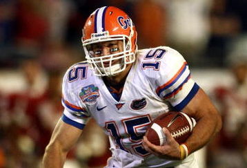 MIAMI - JANUARY 08:  Quarterback Tim Tebow #15 of the Florida Gators runs with the ball against the Oklahoma Sooners in the FedEx BCS National Championship Game at Dolphin Stadium on January 8, 2009 in Miami, Florida.  (Photo by Donald Miralle/Getty Images)