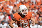 AUSTIN, TX - NOVEMBER 8:  Quarterback Colt McCoy #12 of the Texas Longhorns looks to pass the ball during the game against the Baylor Bears on November 8, 2008 at Darrell K Royal-Texas Memorial Stadium in Austin, Texas.  Texas won 45-21. (Photo by Brian Bahr/Getty Images)