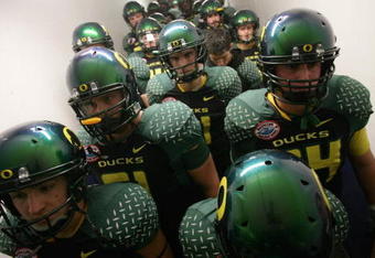 SAN DIEGO, CA - DECEMBER 30:  The University of Oregon Ducks prepare to enter the field against the Oklahoma State University Cowboys during the Pacific Life Holiday Bowl at Qualcomm Stadium on December 30, 2008 in San Diego, California. (Photo by Donald Miralle/Getty Images)