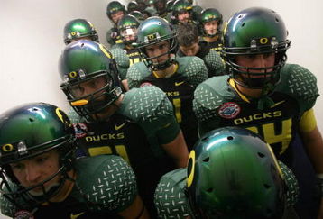 SAN DIEGO, CA - DECEMBER 30:  The University of Oregon Ducks prepare to enter the field against the Oklahoma State University Cowboys during the Pacific Life Holiday Bowl at Qualcomm Stadium on December 30, 2008 in San Diego, California. (Photo by Donald Miralle/Getty Images)