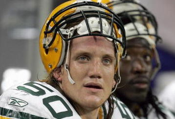 DETROIT - SEPTEMBER 24: A.J. Hawk #50 of the Green Bay Packers looks on from the bench during the game against the Detroit Lions on September 24, 2006 at Ford Field in Detroit, Michigan. (Photo by Jonathan Daniel/Getty Images)