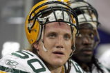 DETROIT - SEPTEMBER 24: A.J. Hawk #50 of the Green Bay Packers looks on from the bench during the game against the Detroit Lions on September 24, 2006 at Ford Field in Detroit, Michigan. (Photo by Jonathan Daniel/Getty Images)