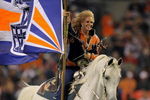 DENVER - AUGUST 30:  Ann Judge Wegener rides Thunder in celebration of a touchdown by the Denver Broncos against the Chicago Bears during preseason NFL action at INVESCO Field at Mile High on August 30, 2009 in Denver, Colorado. The Bears defeated the Broncos 27-17.  (Photo by Doug Pensinger/Getty Images)