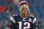 FOXBORO, MA - AUGUST 20:  Tom Brady #12 of the New England Patriots pauses before a game against the Cincinnati Bengals at Gillette Stadium on August 20, 2009 in Foxboro, Massachusetts. (Photo by Jim Rogash/Getty Images)