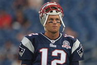 FOXBORO, MA - AUGUST 20:  Tom Brady #12 of the New England Patriots pauses before a game against the Cincinnati Bengals at Gillette Stadium on August 20, 2009 in Foxboro, Massachusetts. (Photo by Jim Rogash/Getty Images)
