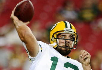 GLENDALE, AZ - AUGUST 28:  Quarterback Aaron Rodgers #12 of the Green Bay Packers warms up prior to the game against the Arizona Cardinals at the University of Phoenix Stadium on August 28, 2009 in Glendale, Arizona.  (Photo by Christian Petersen/Getty Images)