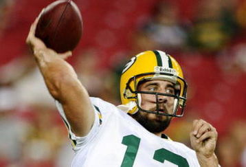GLENDALE, AZ - AUGUST 28:  Quarterback Aaron Rodgers #12 of the Green Bay Packers warms up prior to the game against the Arizona Cardinals at the University of Phoenix Stadium on August 28, 2009 in Glendale, Arizona.  (Photo by Christian Petersen/Getty Images)