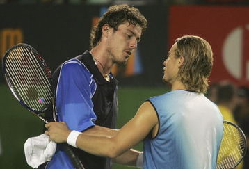 MELBOURNE, AUSTRALIA - JANUARY 30: Lleyton Hewitt of Australia shakes hands with Marat Safin of Russia after the Men's Final during day fourteen of the Australian Open Grand Slam at Melbourne Park January 30, 2005 in Melbourne, Australia. (Photo by Sean Garnsworthy/Getty Images)