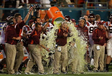 MIAMI - JANUARY 01:  Head coach Frank Beamer of the Virginia Tech Hokies gets gatorade dump on him by his players on their way to winning against the Cincinnati Bearcats during the FedEx Orange Bowl at Dolphin Stadium on January 1, 2009 in Miami, Florida.  (Photo by Doug Benc/Getty Images)