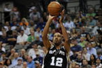 DALLAS - APRIL 25:  Guard Bruce Bowen #12 of the San Antonio Spurs during play against the Dallas Mavericks in Game Four of the Western Conference Quarterfinals during the 2009 NBA Playoffs at American Airlines Center on April 25, 2009 in Dallas, Texas. NOTE TO USER: User expressly acknowledges and agrees that, by downloading and or using this photograph, User is consenting to the terms and conditions of the Getty Images License Agreement.  (Photo by Ronald Martinez/Getty Images)