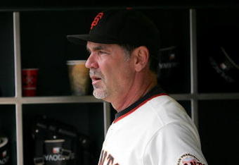 SAN FRANCISCO - AUGUST 30:  San Francisco Giants manager Bruce Bochy #15 stands in the dugout before their game against the Colorado Rockies at AT&T Park on August 30, 2009 in San Francisco, California.  (Photo by Ezra Shaw/Getty Images)