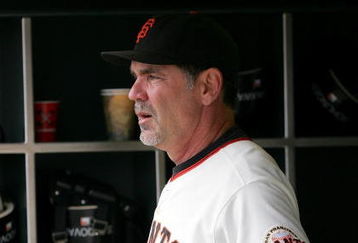 SAN FRANCISCO - AUGUST 30:  San Francisco Giants manager Bruce Bochy #15 stands in the dugout before their game against the Colorado Rockies at AT&T Park on August 30, 2009 in San Francisco, California.  (Photo by Ezra Shaw/Getty Images)