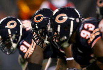 CHICAGO - AUGUST 22: The offensive line of the New York Giants waits to take on the defensive line of the Chicago Bears during a pre-season game on August 22, 2009 at Soldier Field in Chicago, Illinois. The Bears defeated the Giants 17-3. (Photo by Jonathan Daniel/Getty Images)