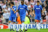 SUNDERLAND, ENGLAND - AUGUST 18: Didier Drogba and Deco (L) of Chelsea show their dejection after conceding the opening goal during the Barclays Premier League match between Sunderland and Chelsea at the Stadium of Light on August 18, 2009 in Manchester, England. (Photo by Michael Regan/Getty Images)