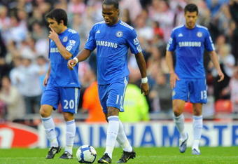 SUNDERLAND, ENGLAND - AUGUST 18: Didier Drogba and Deco (L) of Chelsea show their dejection after conceding the opening goal during the Barclays Premier League match between Sunderland and Chelsea at the Stadium of Light on August 18, 2009 in Manchester, England. (Photo by Michael Regan/Getty Images)