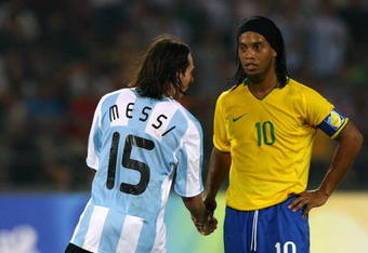 BEIJING - AUGUST 19:  Lionel Messi of Argentina and Ronaldinho of Brazil shake hands during the men's football semifinal match between Argentina and Brazil at Workers' Stadium on Day 11 of the Beijing 2008 Olympic Games on August 19, 2008 in Beijing, China.  (Photo by Shaun Botterill/Getty Images)
