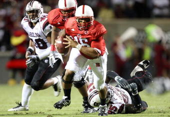 RALEIGH, NC - SEPTEMBER 3:  Quarterback Russell Wilson #16 of the North Carolina State Wolfpack runs with the ball against the South Carolina Gamecocks during the game at Carter-Finley Stadium on September 3, 2009 in Raleigh, North Carolina. (Photo by Streeter Lecka/Getty Images)