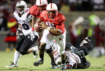 RALEIGH, NC - SEPTEMBER 3:  Quarterback Russell Wilson #16 of the North Carolina State Wolfpack runs with the ball against the South Carolina Gamecocks during the game at Carter-Finley Stadium on September 3, 2009 in Raleigh, North Carolina. (Photo by Streeter Lecka/Getty Images)