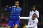 NOTTINGHAM, UNITED KINGDOM - MARCH 31:  Gabriel Obertan of France battles with Andrew Taylor of England during the U-21 International Friendy Match between England and France at the City Ground on March 31, 2009 in Nottingham, England.  (Photo by Laurence Griffiths/Getty Images)