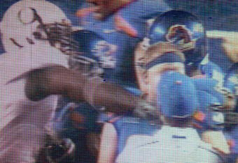 BOISE, ID - SEPTEMBER 3:  Boise State fans watch the video board as LaGarrette Blount #9 of the Oregon Ducks is shown punching a Boise State Broncos player after the game causing quite a commotion and talk of him being arrested on September 3, 2009 at Bronco Stadium in Boise, Idaho. Boise State defeated Oregon 19-8.(Photo by Steve Dykes/Getty Images)