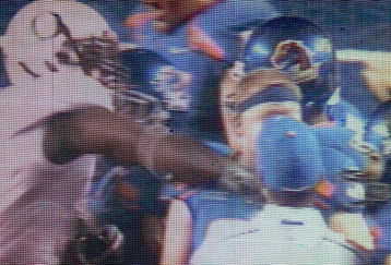 BOISE, ID - SEPTEMBER 3:  Boise State fans watch the video board as LaGarrette Blount #9 of the Oregon Ducks is shown punching a Boise State Broncos player after the game causing quite a commotion and talk of him being arrested on September 3, 2009 at Bronco Stadium in Boise, Idaho. Boise State defeated Oregon 19-8.(Photo by Steve Dykes/Getty Images)