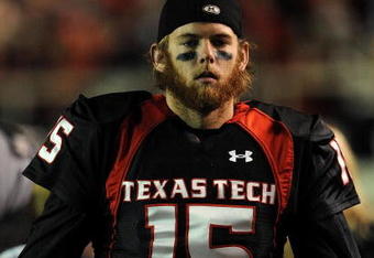 LUBBOCK, TX - NOVEMBER 08:  Quarterback Taylor Potts #15 of the Texas Tech Red Raiders during play against the Oklahoma State Cowboys at Jones AT&T Stadium on November 8, 2008 in Lubbock, Texas.  (Photo by Ronald Martinez/Getty Images)