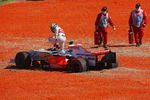 MELBOURNE, AUSTRALIA - MARCH 16:  Giancarlo Fisichella of Italy and Force India ends up in the gravel at the first corner at the start of the Australian Formula One Grand Prix at the Albert Park Circuit on March 16, 2008 in Melbourne, Australia.  (Photo by Mark Thompson/Getty Images)