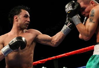 MASHANTUCKET, CT - APRIL 25:  Paulie Malignaggi lands a left Chris Fernandez during their bout at the MGM Grand at Foxwoods on April 25, 2009 in Mashantucket, Connecticut.  (Photo by Nick Laham/Getty Images)