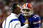 ATLANTA - DECEMBER 06:  Head coach Urban Meyer of the Florida Gators calls a play to quarterback Tim Tebow #15 against the Alabama Crimson Tide during the SEC Championship on December 6, 2008 at the Georgia Dome in Atlanta, Georgia.  (Photo by Kevin C. Cox/Getty Images)