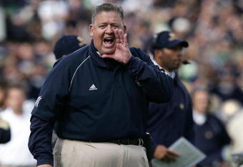 SOUTH BEND, IN - SEPTEMBER 30:  Head coach Charlie Weis of the Notre Dame Fighting Irish coaches against the Purdue Boilermakers September 30, 2006 at Notre Dame Stadium in South Bend, Indiana.  (Photo by Jonathan Daniel/Getty Images)