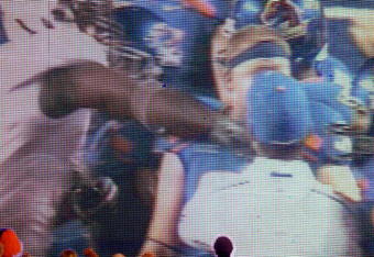 BOISE, ID - SEPTEMBER 3:  Boise State fans watch the video board as LaGarrette Blount #9 of the Oregon Ducks is shown punching a Boise State Broncos player after the game causing quite a commotion and talk of him being arrested on September 3, 2009 at Bronco Stadium in Boise, Idaho. Boise State defeated Oregon 19-8.(Photo by Steve Dykes/Getty Images)