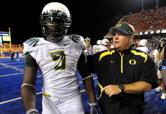 BOISE, ID - SEPTEMBER 3:  LaGarrette Blount #9 of the Oregon Ducks is escorted off the field by head coach Chip Kelly after Blount punched a Boise State Broncos player on September 3, 2009 at Bronco Stadium in Boise, Idaho. Boise State defeated Oregon 19-8.  (Photo by Steve Dykes/Getty Images)