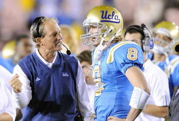 PASADENA, CA - NOVEMBER 08:  Head coach Rick Neuheisel talks with Chris Forcier #8 of the UCLA Bruins during the game against the Oregon State Beavers at the Pasadena Rose Bowl on November 8, 2008 in Pasadena, California.  (Photo by Lisa Blumenfeld/Getty Images)