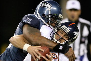 SEATTLE - AUGUST 22:  Quarterback Tom Brandstater #3 of the Denver Broncos is sacked by Michael Bennett #96 of the Seattle Seahawks on August 22, 2009 at Qwest Field in Seattle, Washington.  The Seahawks defeated the Broncos 27-13. (Photo by Otto Greule Jr/Getty Images)