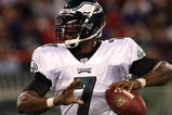 EAST RUTHERFORD, NJ - SEPTEMBER 03:  Michael Vick #7 of the Philadelphia Eagles looks to throw a pass against the New York Jets on September 3, 2009 at Giants Stadium in East Rutherford, New Jersey. The Jets defeated the Eagles 38-27.  (Photo by Jim McIsaac/Getty Images)