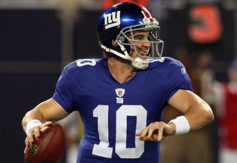 EAST RUTHERFORD, NJ - AUGUST 29:  Eli Manning #10 of the New York Giants looks to throw a pass against the New York Jets on August 29, 2009 at Giants Stadium in East Rutherford, New Jersey.  (Photo by Jim McIsaac/Getty Images)
