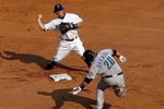 ARLINGTON, TX - SEPTEMBER 01:  Second baseman Ian Kinsler #5 of the Texas Rangers makes the out against Rod Barajas #20 of the Toronto Blue Jays on September 1, 2009 at Rangers Ballpark in Arlington, Texas.  (Photo by Ronald Martinez/Getty Images)
