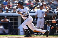 NEW YORK - AUGUST 30: Derek Jeter #2 of the New York Yankees hits a base hit against the Chicago White Sox during their game on August 30, 2009 at Yankee Stadium in the Bronx borough of New York City. (Photo by Chris McGrath/Getty Images)