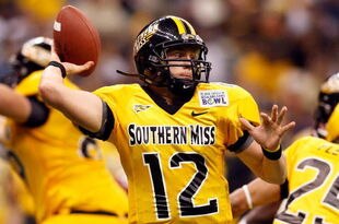 NEW ORLEANS - DECEMBER 21: Quarterback Austin Davis #12 of the Southern Mississippi Golden Eagles looks to throw a pass against the Troy Trojans during the R+L Carriers New Orleans Bowl on December 21, 2008 at the Superdome in New Orleans, Louisiana. Davis was named MVP after defeating the Trojans 30-27 in overtime. (Photo by Chris Graythen/Getty Images)