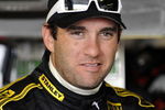 BROOKLYN, MI - AUGUST 15:  Elliott Sadler driver of the #19 Stanley Tools Dodge, stands in the garage during practice for the NASCAR Sprint Cup Series Michigan 400 at Michigan Internetional Speedway on August 15, 2009 in Brooklyn, Michigan.  (Photo by John Harrelson/Getty Images for NASCAR)