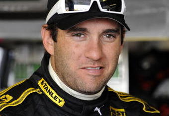 BROOKLYN, MI - AUGUST 15:  Elliott Sadler driver of the #19 Stanley Tools Dodge, stands in the garage during practice for the NASCAR Sprint Cup Series Michigan 400 at Michigan Internetional Speedway on August 15, 2009 in Brooklyn, Michigan.  (Photo by John Harrelson/Getty Images for NASCAR)