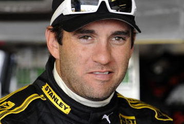 BROOKLYN, MI - AUGUST 15:  Elliott Sadler driver of the #19 Stanley Tools Dodge, stands in the garage during practice for the NASCAR Sprint Cup Series Michigan 400 at Michigan Internetional Speedway on August 15, 2009 in Brooklyn, Michigan.  (Photo by John Harrelson/Getty Images for NASCAR)