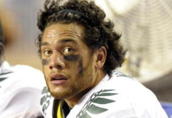 BOISE, ID - SEPTEMBER 3:  Jeremiah Masoli #8 of the Oregon Ducks watches the clock as it winds downs and the Boise State Broncos defeat Oregon 19-8 on September 3, 2009 at Bronco Stadium in Boise, Idaho. (Photo by Steve Dykes/Getty Images)