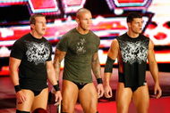 LAS VEGAS - AUGUST 24:  (L-R) Wrestlers Ted DiBiase, Randy Orton and Cody Rhodes appear during the WWE Monday Night Raw show at the Thomas & Mack Center August 24, 2009 in Las Vegas, Nevada.  (Photo by Ethan Miller/Getty Images)